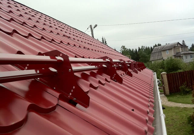 Установка снегозадержателей